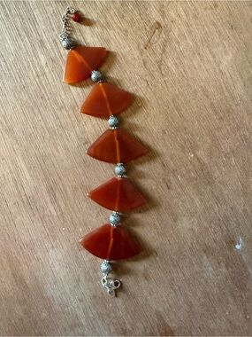 carnelian or red agate translucent, fan-shaped) stones with silver hardware